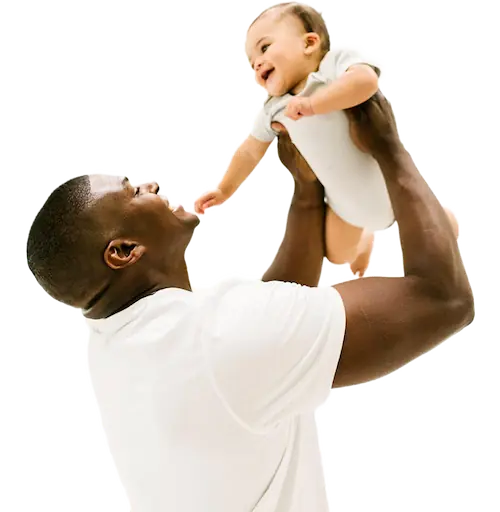 African American father affectionately holding his child in the air above his head