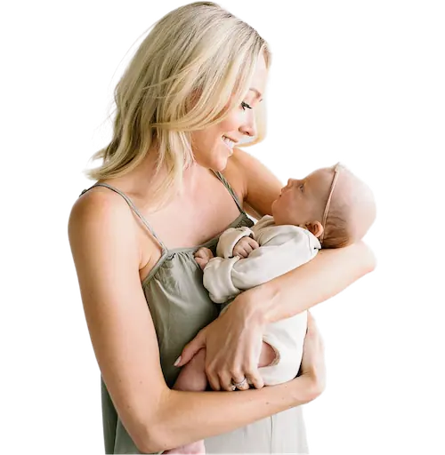 Two smiling newborn babies laying side-by-side